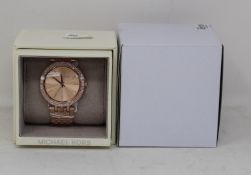 A ladies as new Michael Kors Darci watch in rose gold (MK3192).
