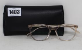 A pair of as new Ace & Tate prescription glasses with case.