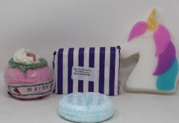 A quantity of assorted soaps and bath bombs.