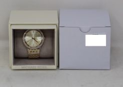 A ladies as new Michael Kors Darci watch in gold (MK3191).