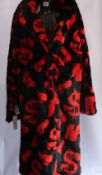 An as new Namilia Dick Dollar monogram long faux fur coat (M/L - RRP $240).