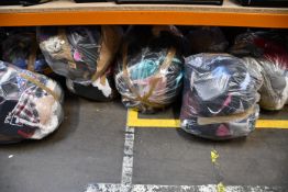 Eight bags of assorted clothing and related items.