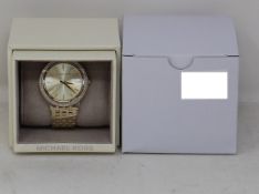 A ladies as new Michael Kors Darci watch in gold (MK3191).