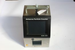 A pre-owned Kanomax 3900 Airborne Particle Counter with case.