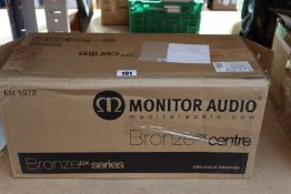 A boxed Monitor Audio Bronze BX Centre Walnut.