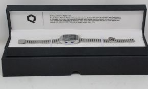 An as new Q Timex Reissue Digital LCA 32.5mm stainless steel bracelet watch in case.