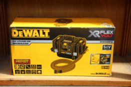 A boxed DeWalt DCV586MT2 FlexVolt XR Dust Extractor.