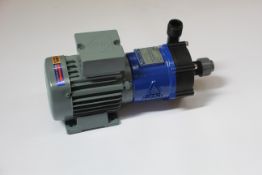 A boxed Iwaki Magnet Pump MD-100R-5M.
