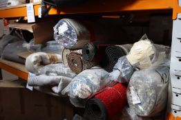 A quantity of rugs/carpets.