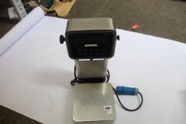 A pre-owned Avery Weigh-Tronix ZQ375 Commercial Scale.