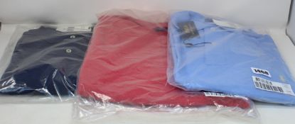 Four items of as new Ralph Lauren 3XB clothing; two polo shirts, a sweater and quarter zip sweater.
