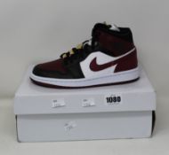 A pair of women's as new Nike Air Jordan 1 Mid SE (UK 3.5).