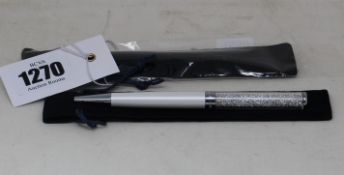 Four as new Swarovski Crystalline ball point pens (RRP £35 each).