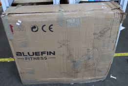 A boxed Bluefin Fitness Tour SP Exercise Bike.