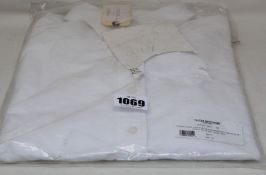 An as new Thom Browne New York classic long sleeve button down point collar shirt (Size 42).