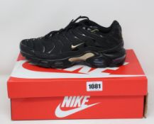 A pair of as new Nike Air Max Plus (UK 7).
