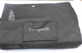 A pre-owned Vesgantti portable massage table in beige white.