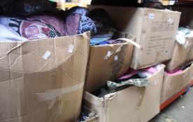 Seven boxes of assorted clothing and related items.