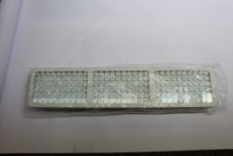 A boxed SGROW Indoor PM900 Dual Switch LED Light (For healing of muscle and ligament sprains).