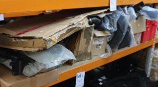 A shelf containing as new genuine car parts.
