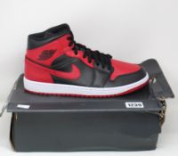 A pair of as new Nike Air 1 Mid sneakers (UK 10.5 - Damaged box).