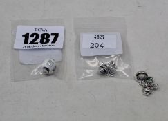 One as new Pandora Disney Lilo & Stitch charm (796338ENMX), a Pandora Spiritual Dreamcatcher