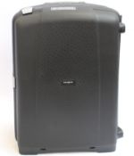A boxed Samsonite Aeris upright 78cm suitcase in black.
