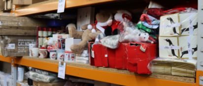 A quantity of Christmas items to include wrapping paper, Christmas cards and Christmas trees.