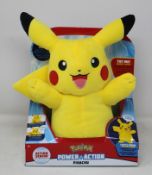 Twelve boxed as new Pokemon Power Action Pikachu cuddly toys.
