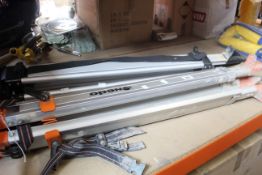 Two pre-owned heavy duty tripods.