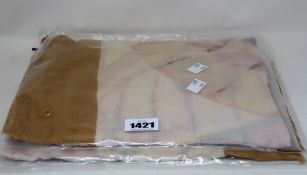 Four as new Unmade Copenhagen Imone scarves (RRP £45 each).