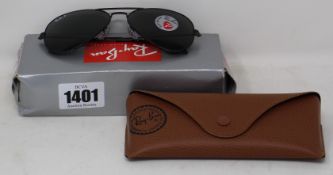 A pair of as new Ray Ban sunglasses.