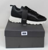 A pair of as new Mario Falcone Belvotti Milano trainers (UK 8).