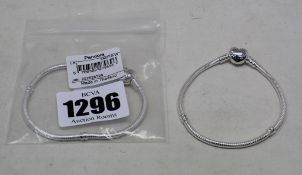 Two as new Pandora moments heart clasp snake chain bracelets (590719-19).