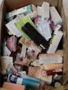 A box of as new toiletries/cosmetics/skin care items.