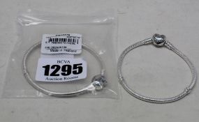 Two as new Pandora moments heart clasp snake chain bracelets (590719-19).