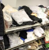 A quantity of as new assorted clothing and related items.
