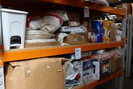 Two shelves of household and related items.