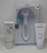 An as new Nu Skin Lumispa (Damage to outer box), a Nu Skin Lumispa cleanser and a Nu Skin