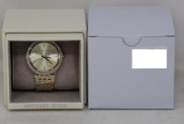 A ladies as new Michael Kors Darci watch in gold (MK3191).