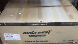 A boxed Anda Seat Axe Series Gaming Chair in black and white.