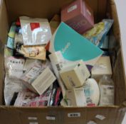 A box of as new luxury beauty items and toiletries to include Heimish all clean balm, Clean It