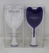 Fifty boxed as new Tangel Angel 2.0 Detailing Brushes in white.