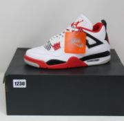 A pair of as new Nike Air Jordan 4 Retro (UK 8.5).