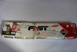 A boxed Rubi Fast 85 Tile Cutter.