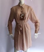 An as new Burberry Monogram print crepe de chine shirt dress (Size 8 RRP £1190).