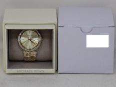 A ladies as new Michael Kors Darci watch in gold (MK3191).