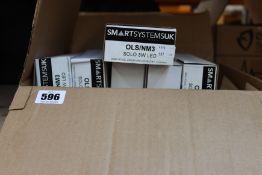 Six boxed as new One-LED Solo emergency lighting units.