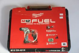A boxed Milwaukee M12 CH-421X 12v Compact SDS Brushless Hammer Drill.