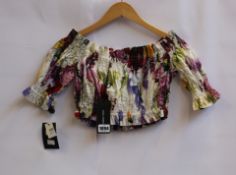 An as new Dolce & Gabbana cropped floral top (Size 40).